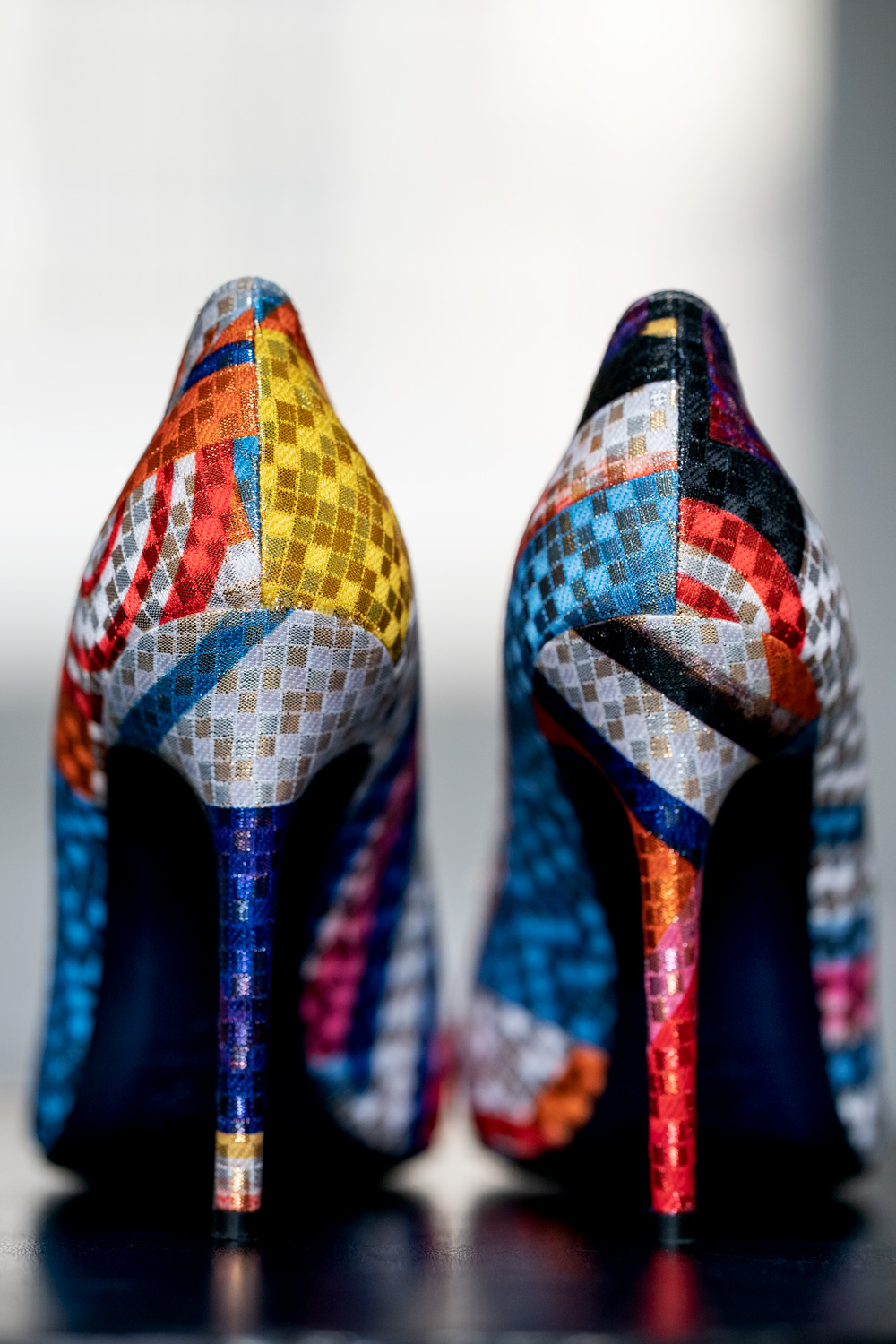 Multicolour patchwork pumps viewed from behind
